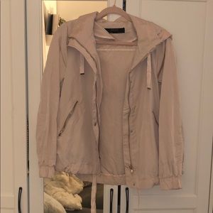 Dusty rose colored windbreaker